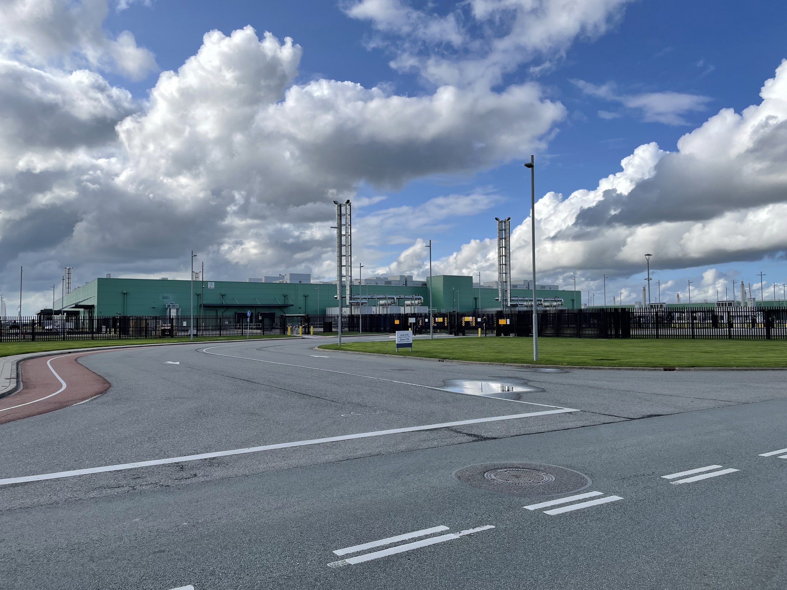 Microsoft data center campus in Middenmeer, Netherlands, with power infrastructure under a cloudy sky