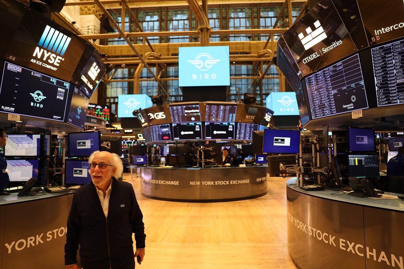 Traders on the floor of the New York Stock Exchange, which is open on Columbus Day