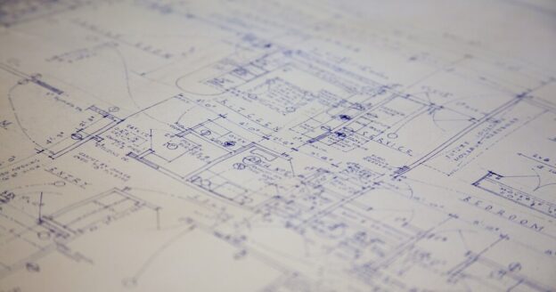 Close-up of an architectural blueprint, the plan behind every well-built site